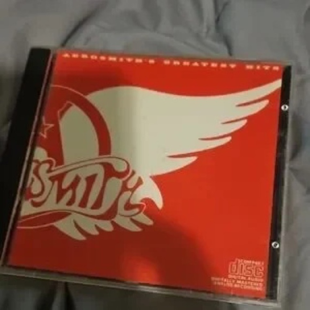 's Greatest Hits CD - Red Cover